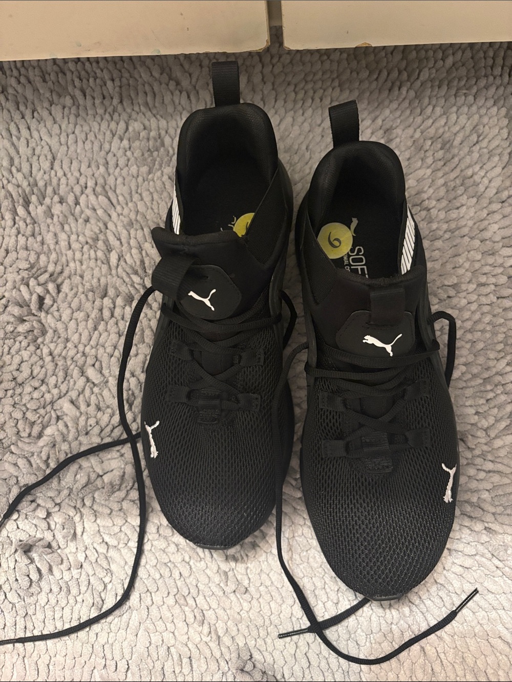Puma Women’s Black Athletic Sneakers with White Logos